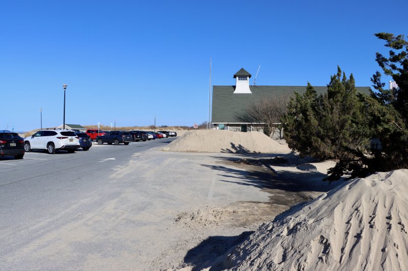 Sand is piled up in the parking lot at Savannah Beach in Lewes. The city will close that beach and Johnnie Walker Beach from March 16 to April 10 for a replenishment project to remove the sand. It will be relocated on the narrowest part of Lewes Beach. Both beaches will be open Sundays only. BILL SHULL PHOTOS